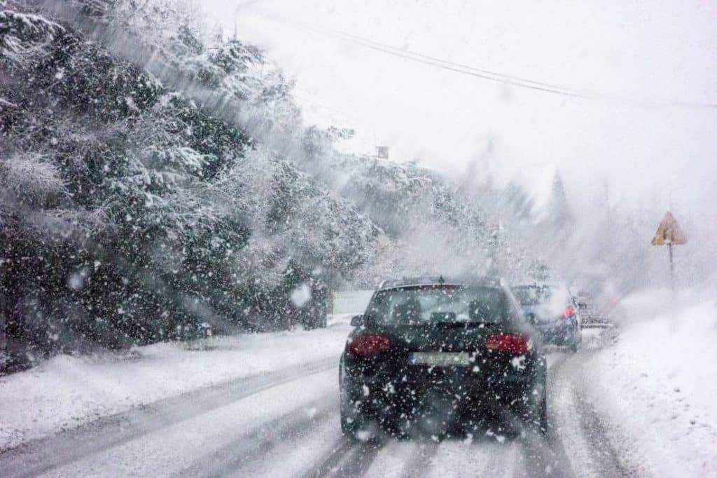 car in the snow in Snoqualmie Pass